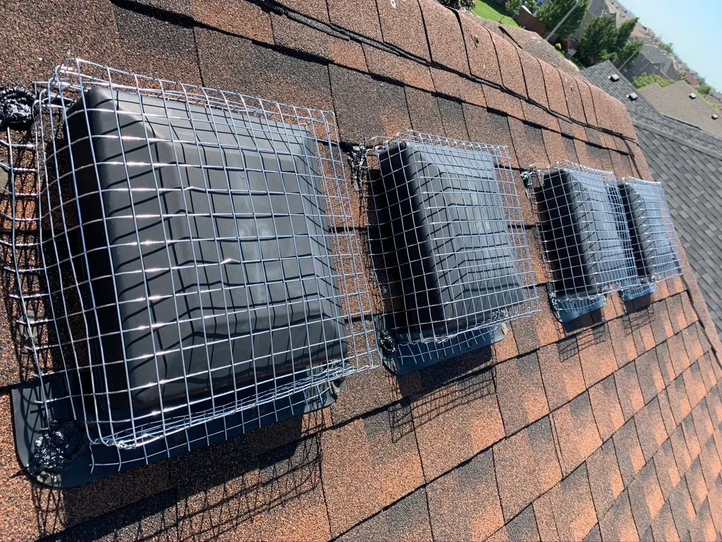 Worker positioning solar panels for installation